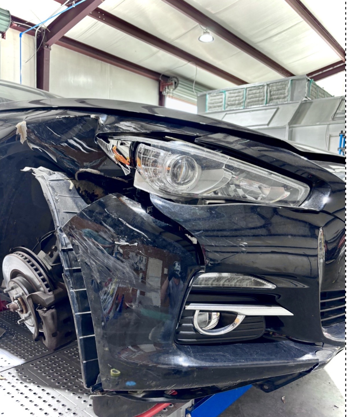 Infiniti front end torn down for repair